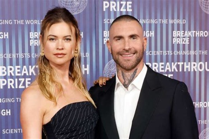 How Much are Behati Prinsloo and Adam Levine Worth?
