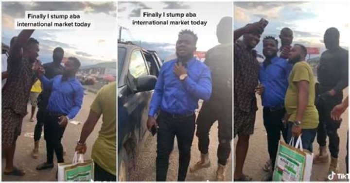 Man Who Looks Like Comedian Sabinus Storms Aba International Market with Security, People Rush Him in Video